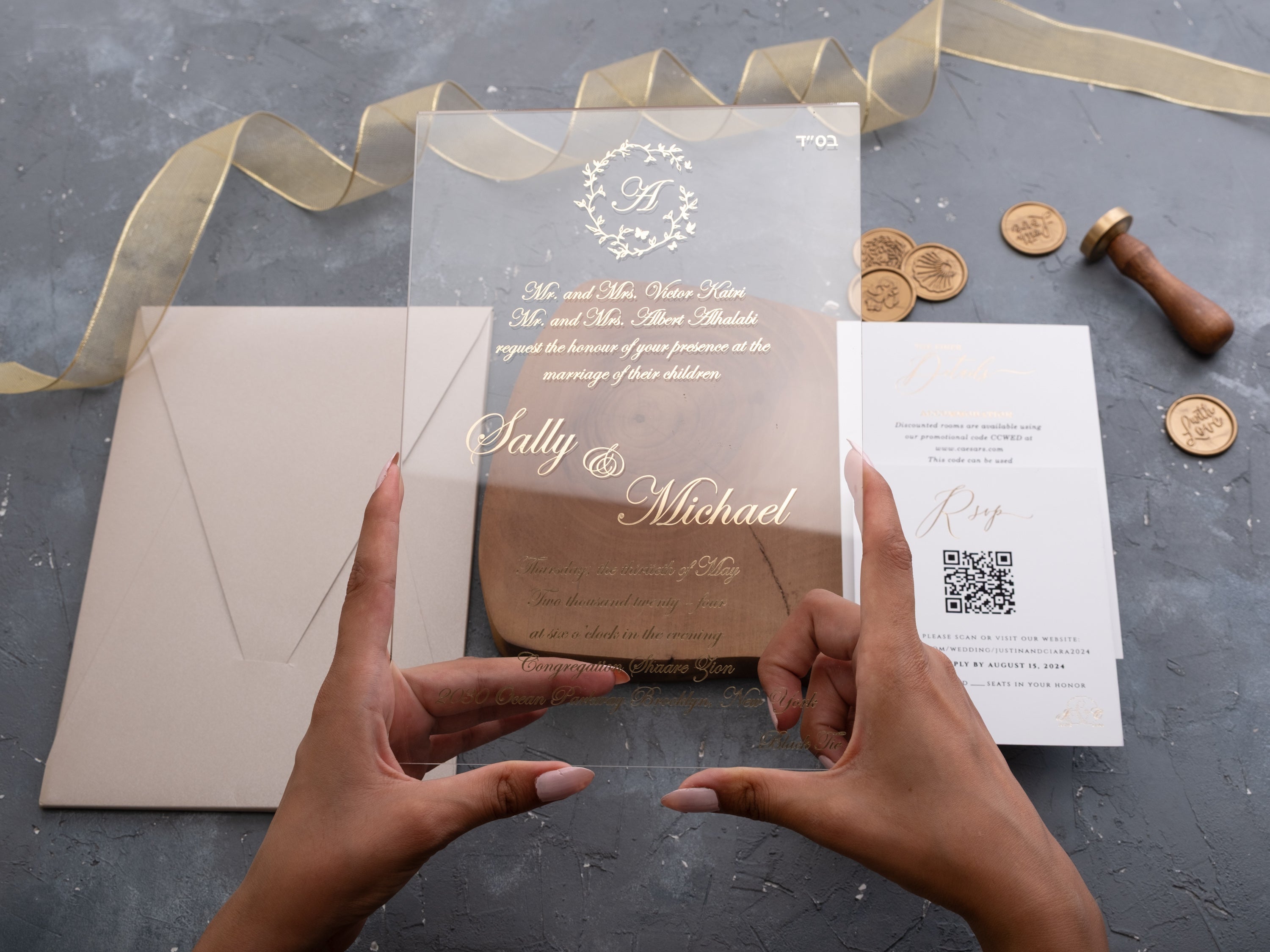 Thick clear acrylic wedding invitation with a modern floral design