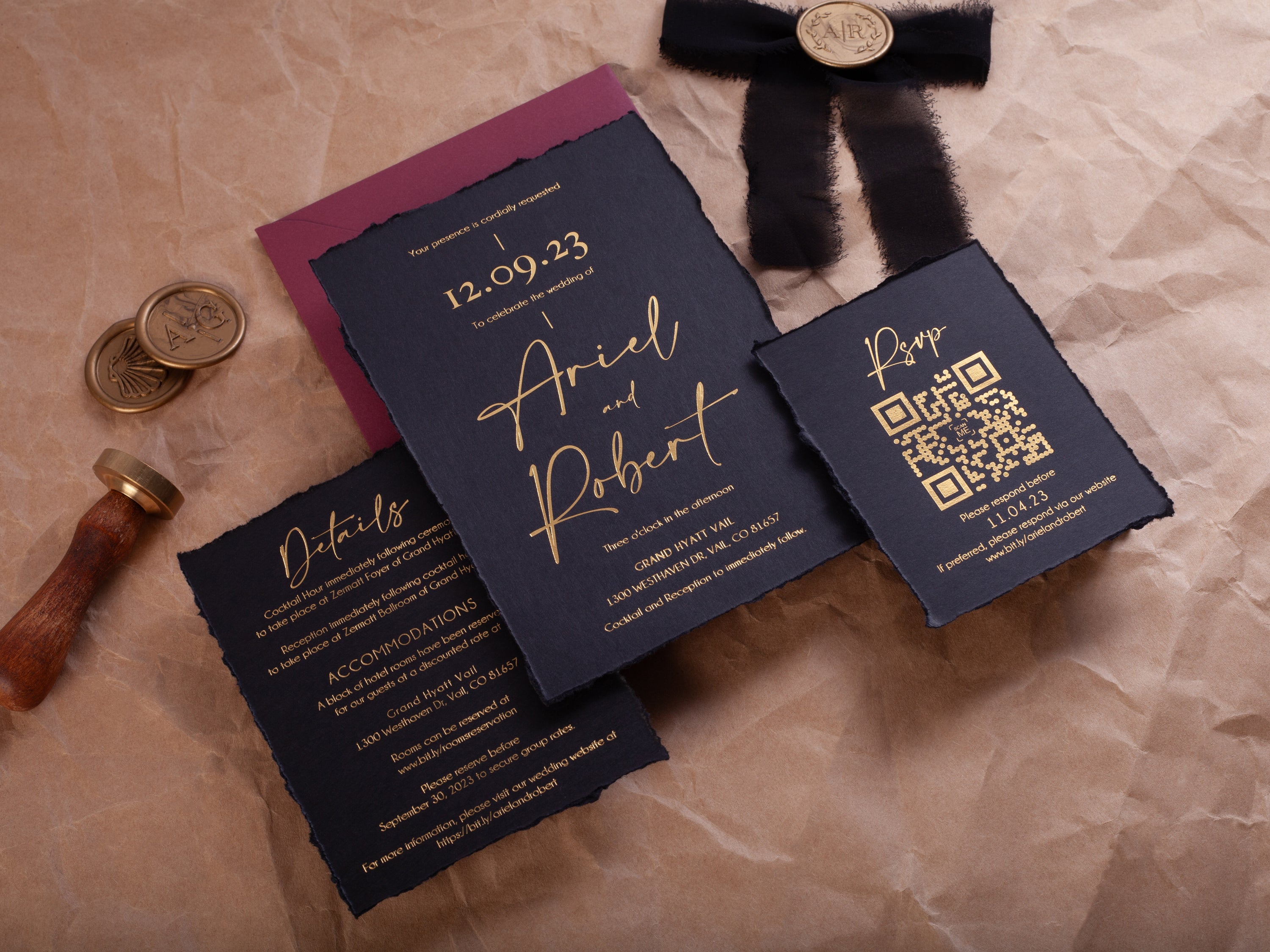 Black and gold deckle edge wedding invitation suite with wax seal, black ribbon, burgundy envelope, and QR RSVP card by World of Wedding Co.