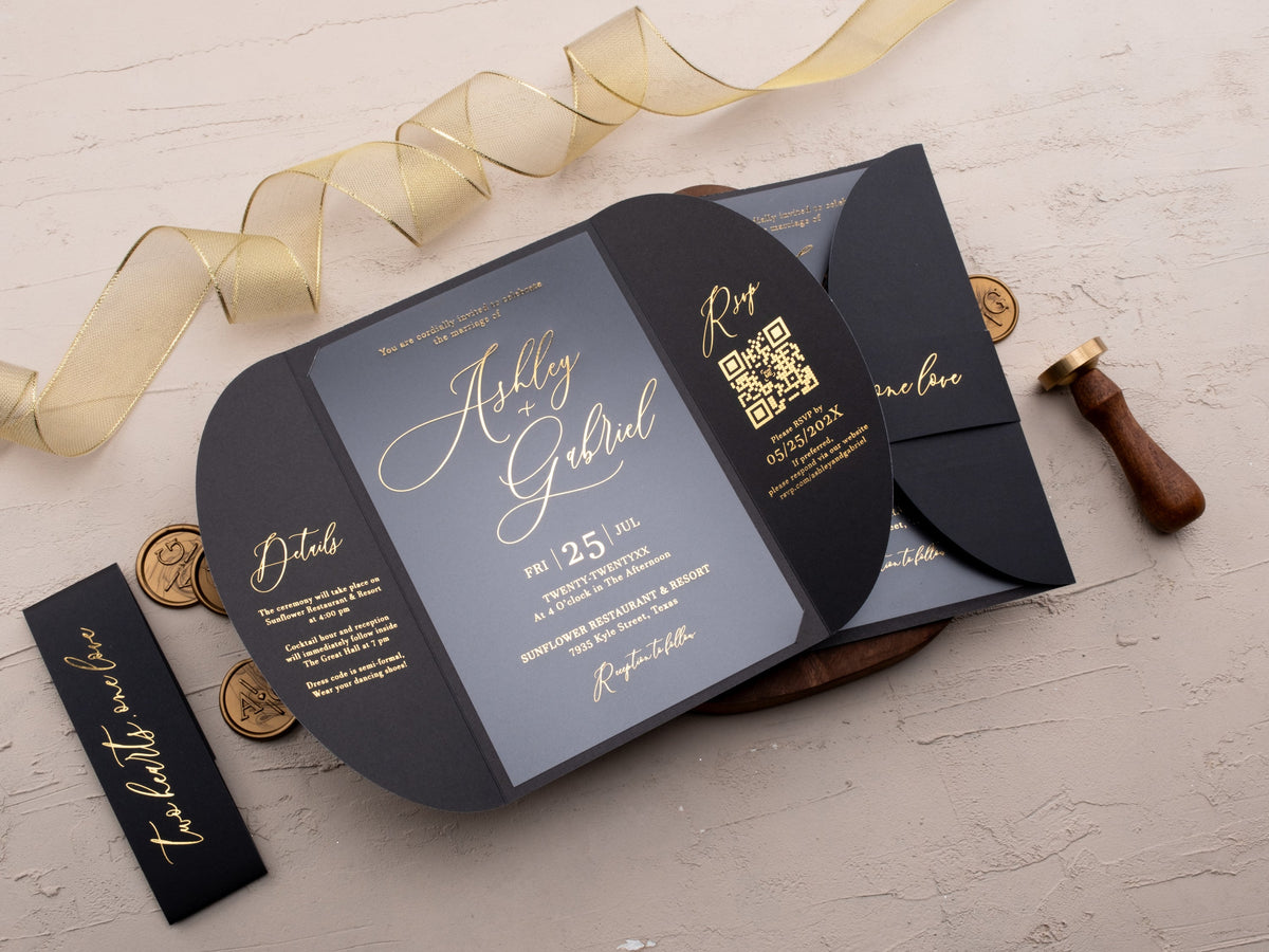 Black gatefold acrylic wedding invitation with reflective gold foil lettering