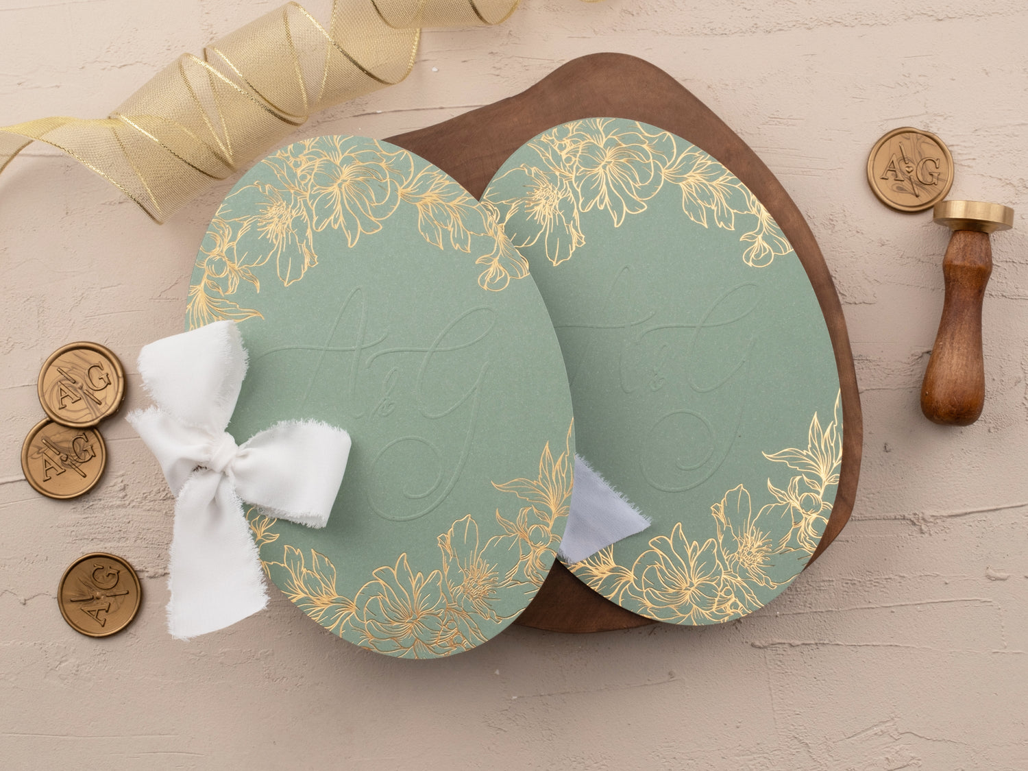 Sage green and gold floral wedding invitation with foil design