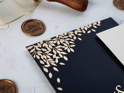 Black and Gold Wedding Invitation with Embossed Leaves