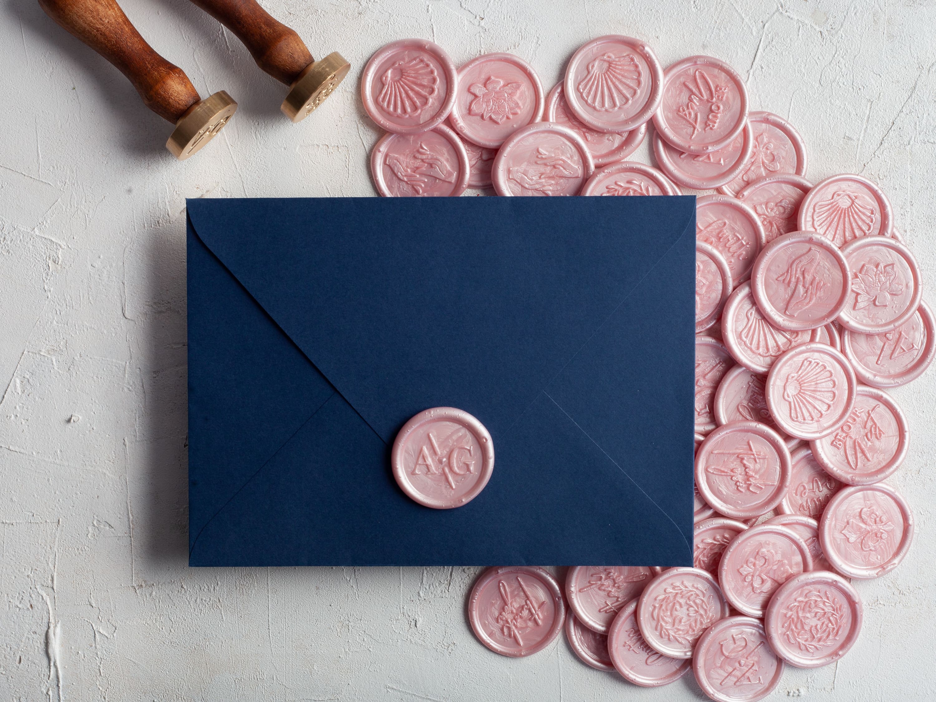 Personalized pink envelope seal for wedding invitations